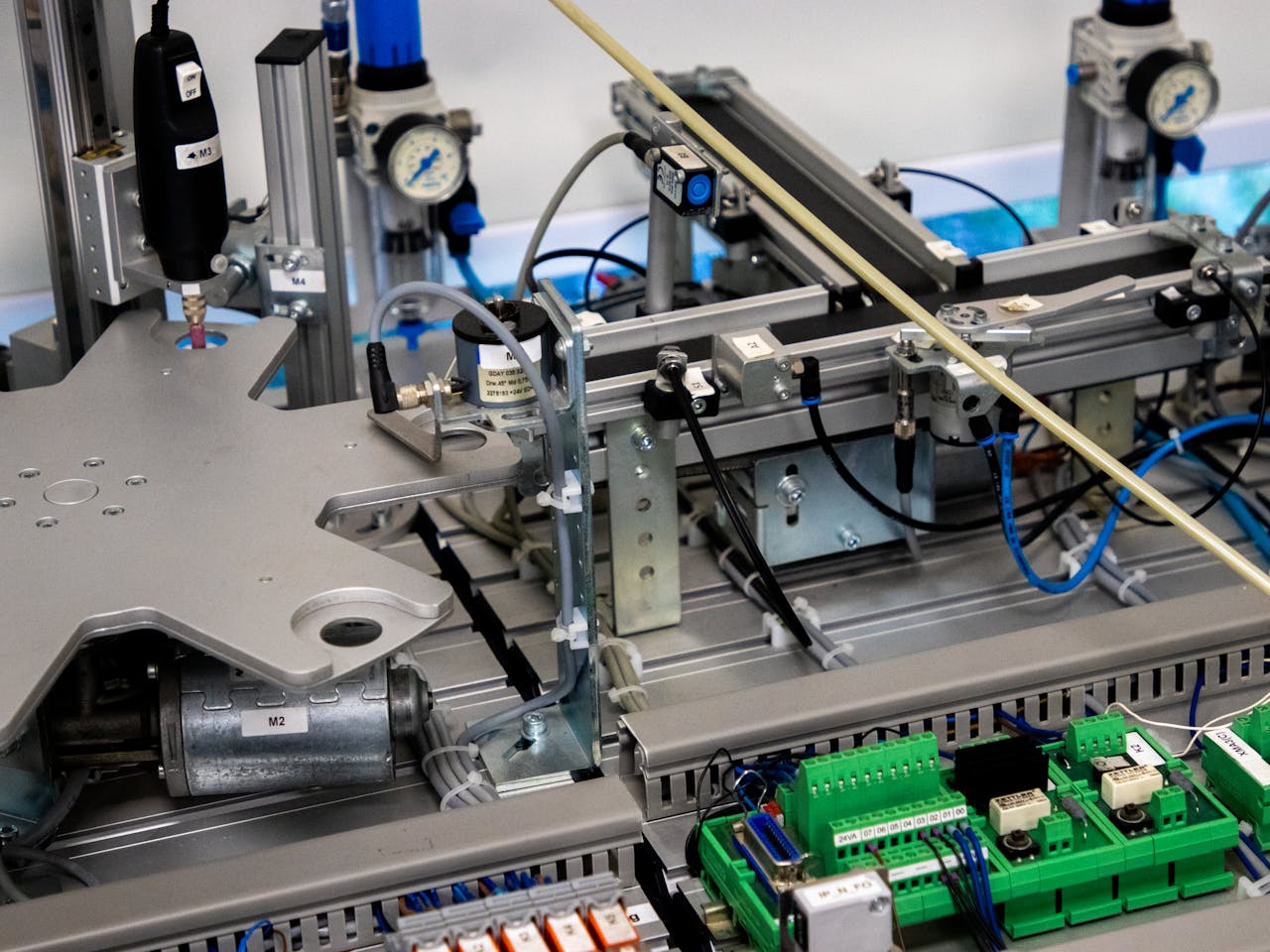 services-03 Close-up of advanced machinery showcasing robotic automation and precision engineering.